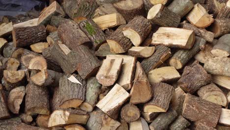 a pile of firewood logs ready for the fireplace