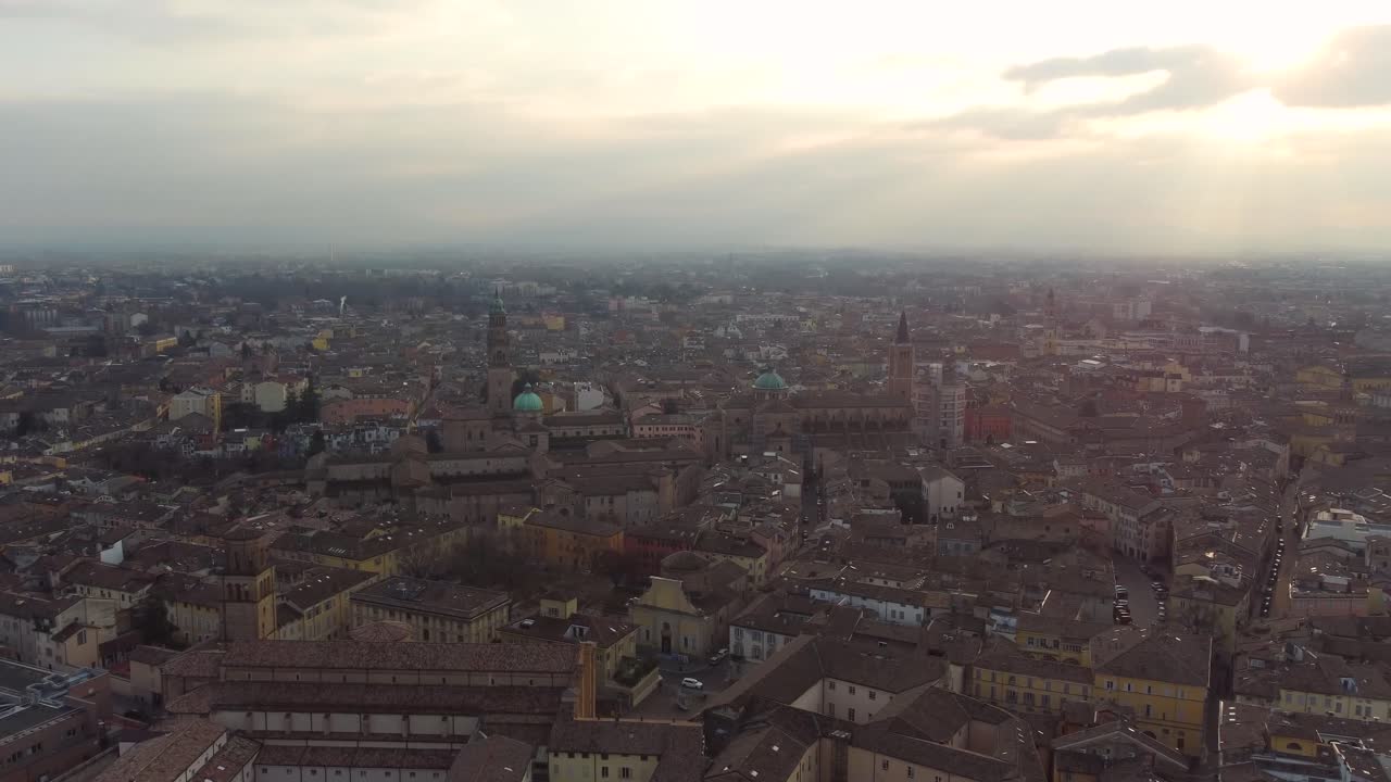 Parma Cathedral with celestial lights coming from a beautiful sunset.