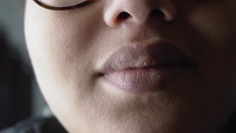 beautiful natural lips of a black woman close up