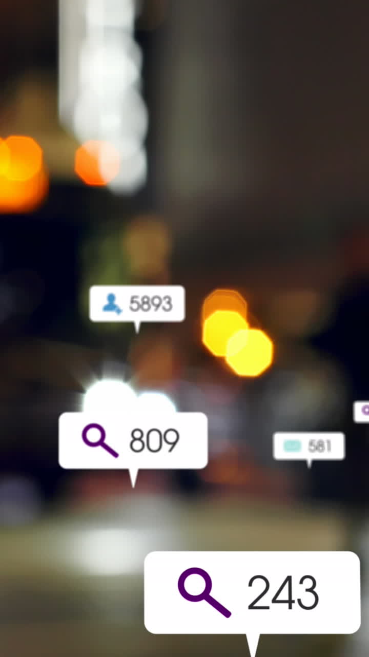 Animation of social media icons and numbers over out of focus city and traffic lights