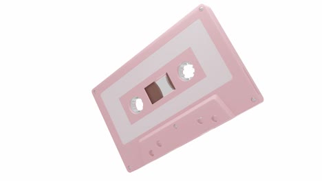 pale pink cassette tape isolated on a white background.