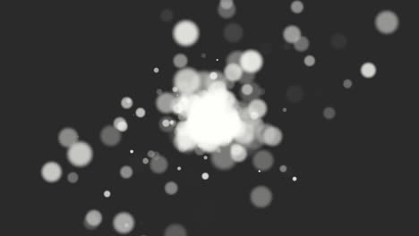 Fly-and-falling-white-round-particles-with-glitters-on-black-gradient