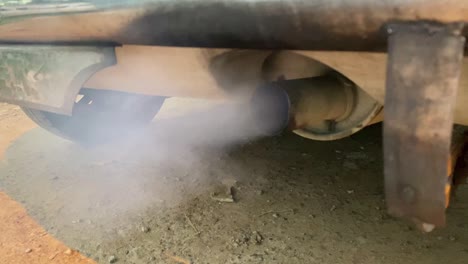 air pollution from vehicle exhaust pipe, black smoke foam car exhaust pipe