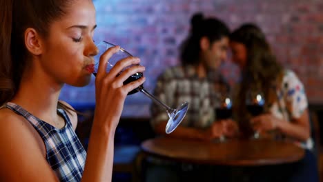 Jealous-woman-looking-at-couple-flirting-with-each-other