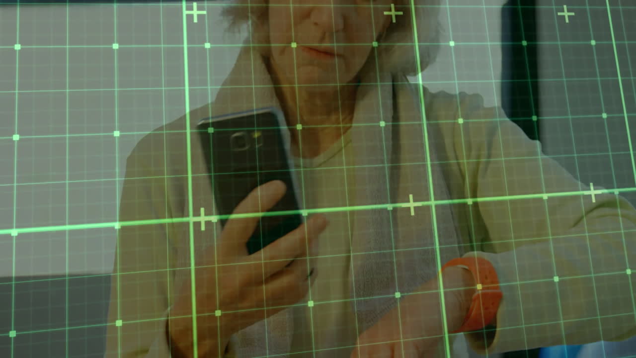 Using smartphone and smartwatch, elderly woman with digital animation overlay