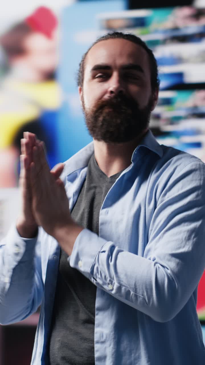 Vertical Video Determined successful guy enjoying digital connection between users