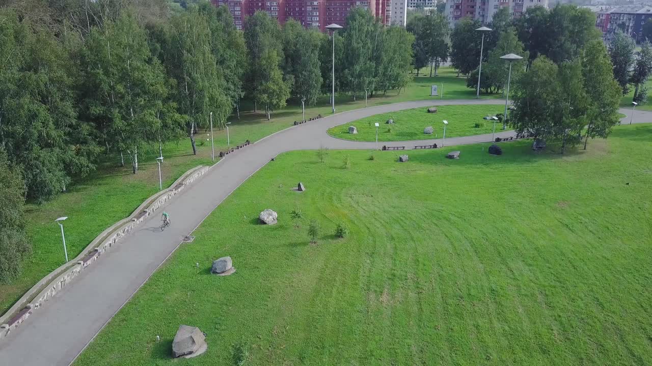 Aerial View of a City Park with a Cyclist