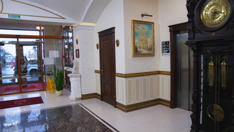 young businesswoman standing in elevator. young business lady in elevator at hotel