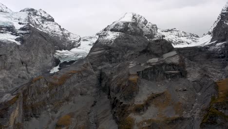 Aerial-view-of-Mountains-peaks-on-glacier-lake-Oeschinensee