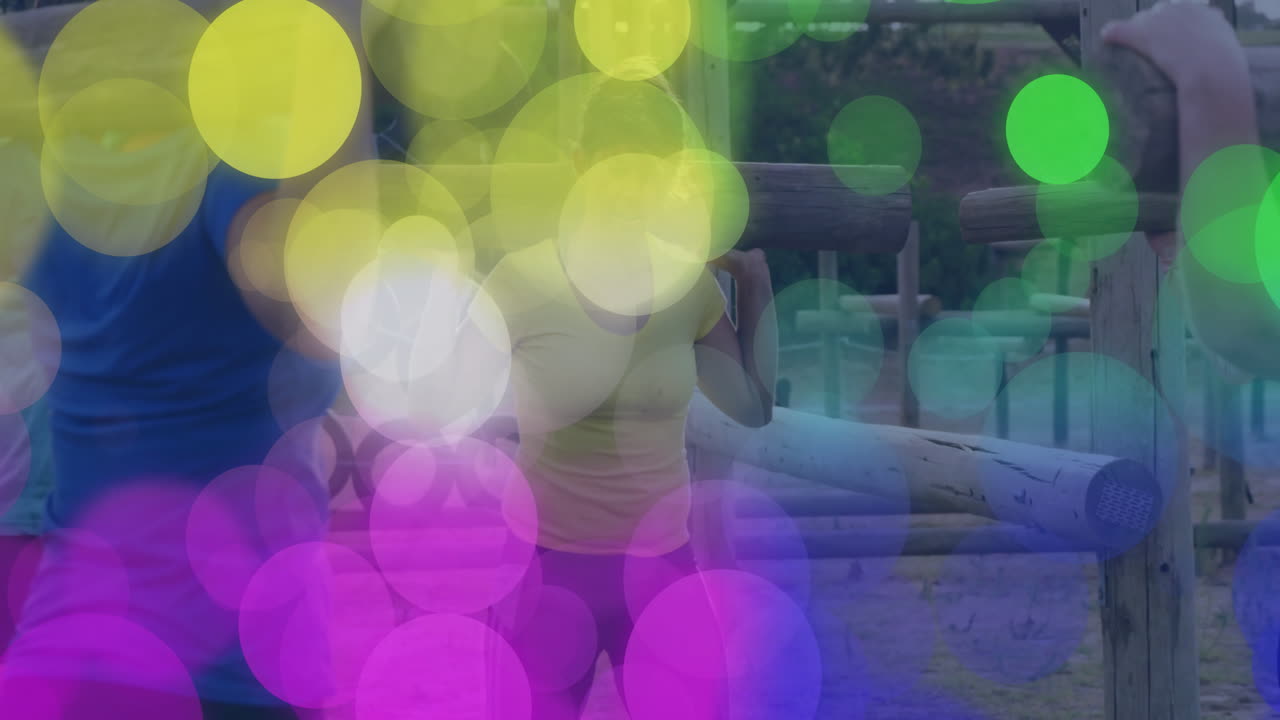 Exercising outdoors, people surrounded by colorful bokeh lights animation effect