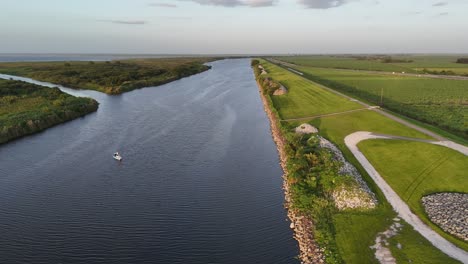 small recreational fishing boat on the southern park of lake okeechobee, largest freshwater lake in florida