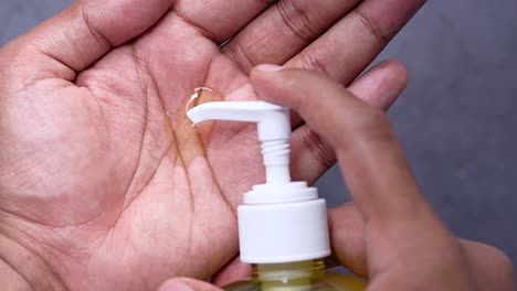 applying hand lotion or sanitizer