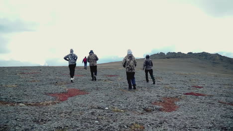 hikers on a rocky mountain ridge