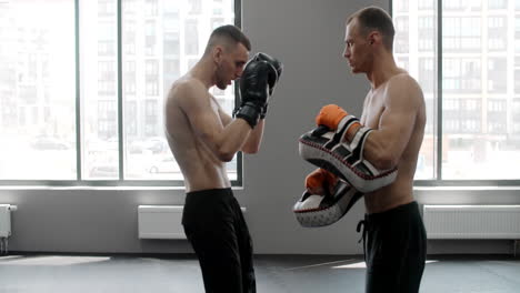 men boxing training session