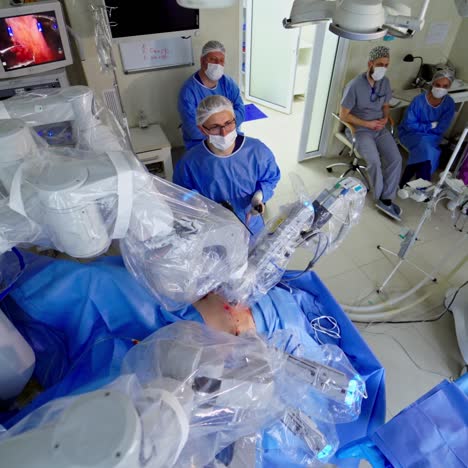 robotic surgery in hospital with robotic technology equipment. machine arm surgeon in futuristic operating room. minimally invasive surgical innovation