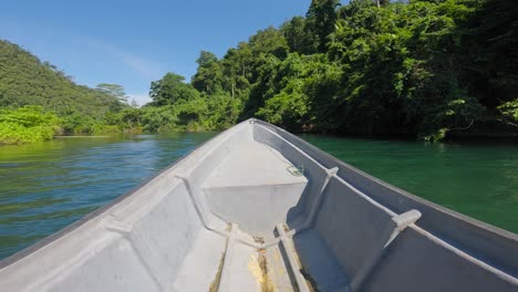 boating at kali biru in raja ampat, west papua, indonesia