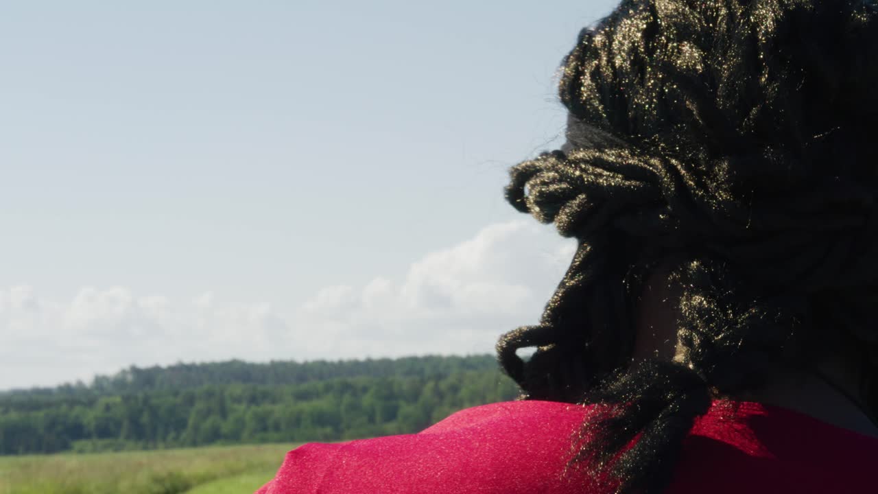 Samson with back to screen looking over his shoulder in both directions, Biblical character with long dreads, Israelite warrior and judge, black male in old testament, Christian