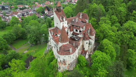 aerial view of majestic bran castle, also known as dracula's castle, nestled in the carpathian mountains