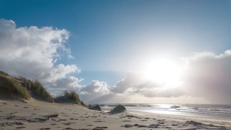 beautiful timelapse at the beach, sunny day with fluffy clouds static