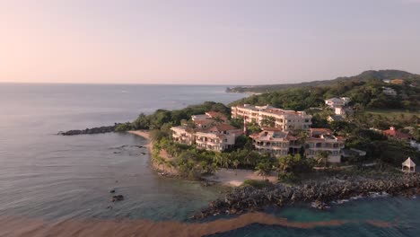 Sunset-flight-above-the-sea,-Roatan,-Honduras