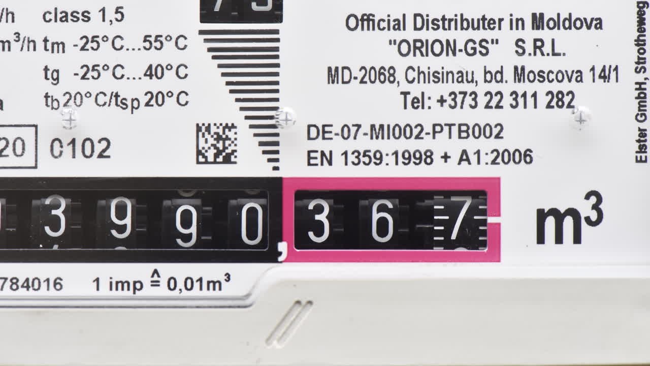 CHISINAU, MOLDOVA - DECEMBER, 2022: Timelapse view of the gas meter on the wall with the increasing indicator of the spent gas