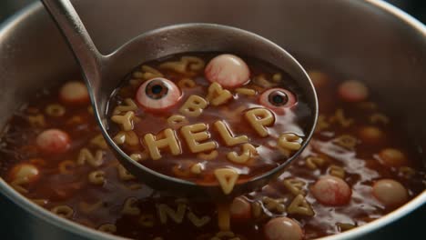 a disturbing scene in a pot: spooky soup featuring floating eyeballs and alphabet pasta spelling 'help' captivates the viewer with its eerie charm