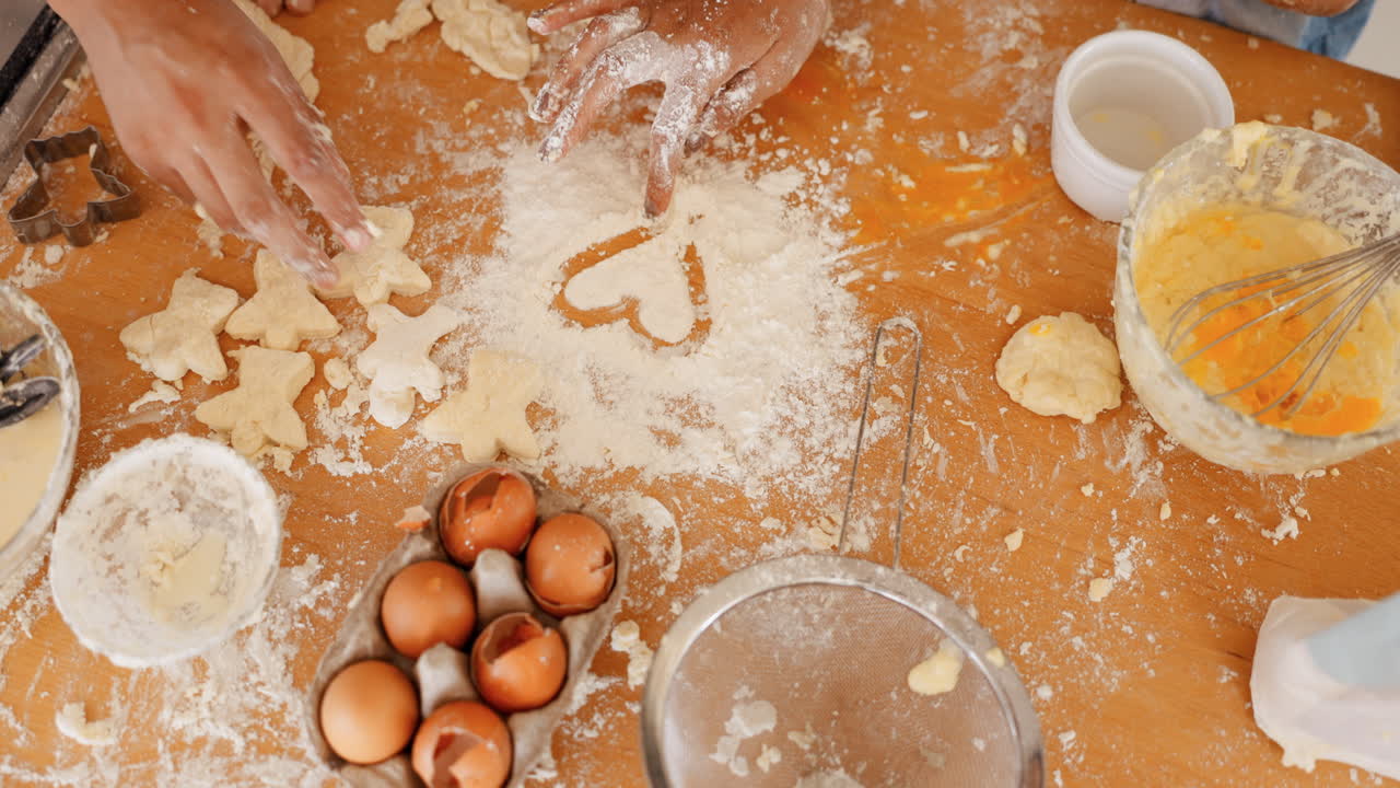 Hands, heart and flour with a family baking