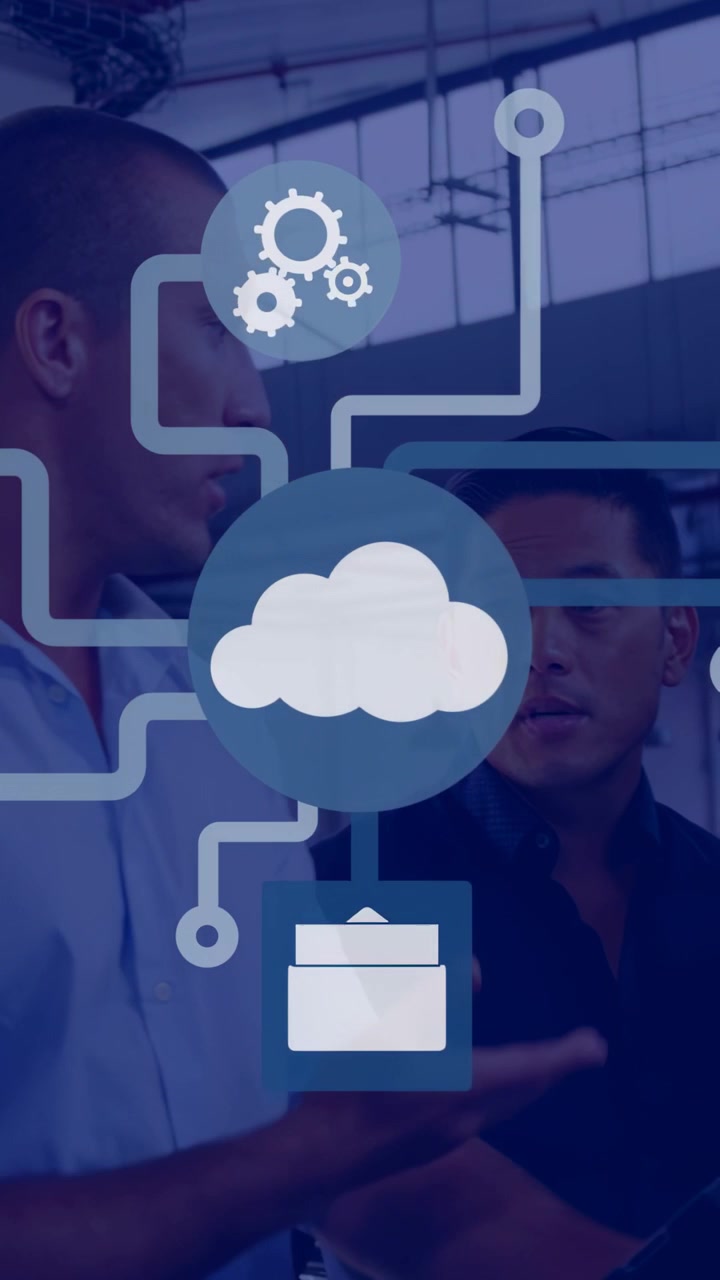 Vertical video: Lead man tapping tablet, showing cloud, gear and mail icons linking for tech demo