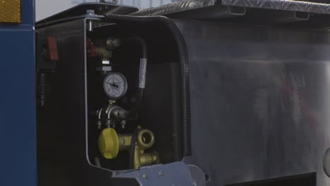 truck mechanic working on a vehicle