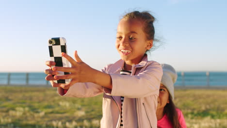 girl children, park and selfie with smartphone