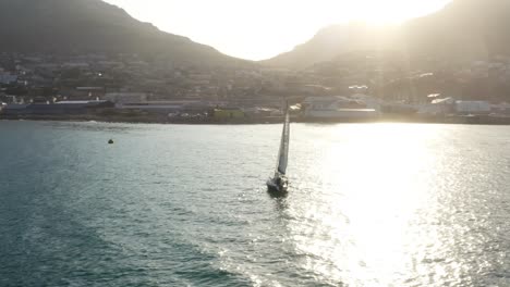 a yacht sailing back to the bay