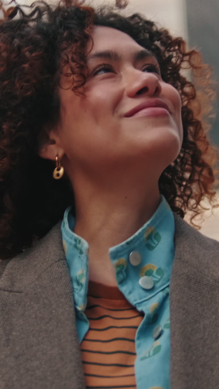 Happy Young Woman Walking in the City