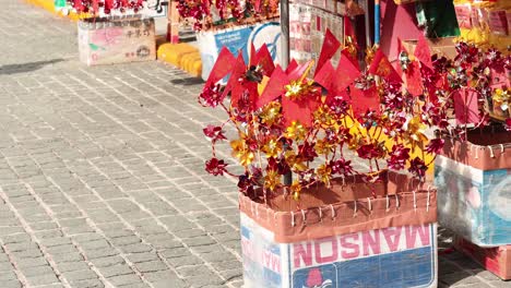 vibrant red and yellow decorations on display