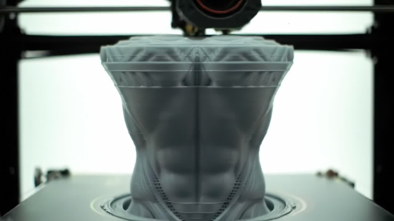 A Close-Up View of a 3D Printer Creating a Sculptural Object with Intricate Details, Showcasing the Artistry of Modern Manufacturing Techniques and Design Innovation