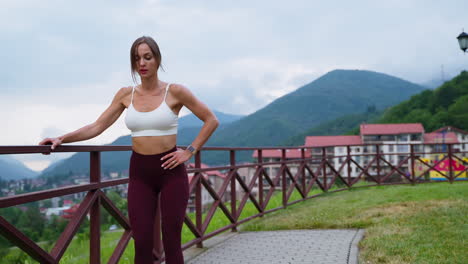 woman exercising outdoors in a mountain setting