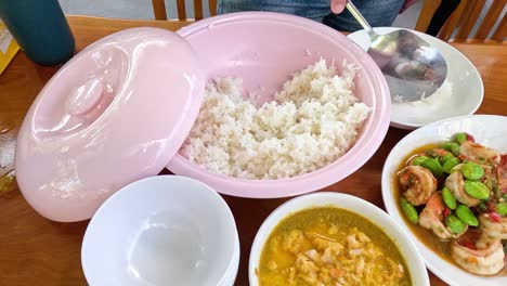 serving and sharing food at a family meal