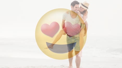 happy smiling couple walking on the beach with a love smiley for valentines day