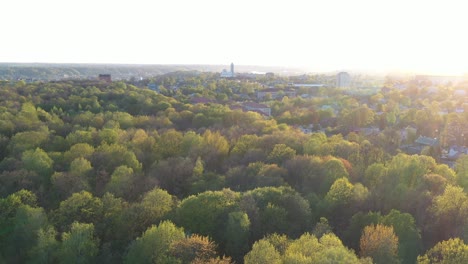 Drone-aerial-view-of-oakwood-park-in-Kaunas,-Lithuania