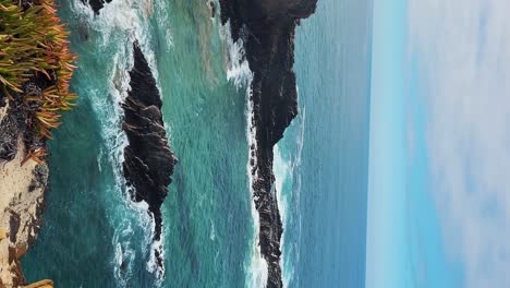 The-Almograve-Beach-With-Black-Basalt-Rocks-in-Alentejo-Coast,-Portugal