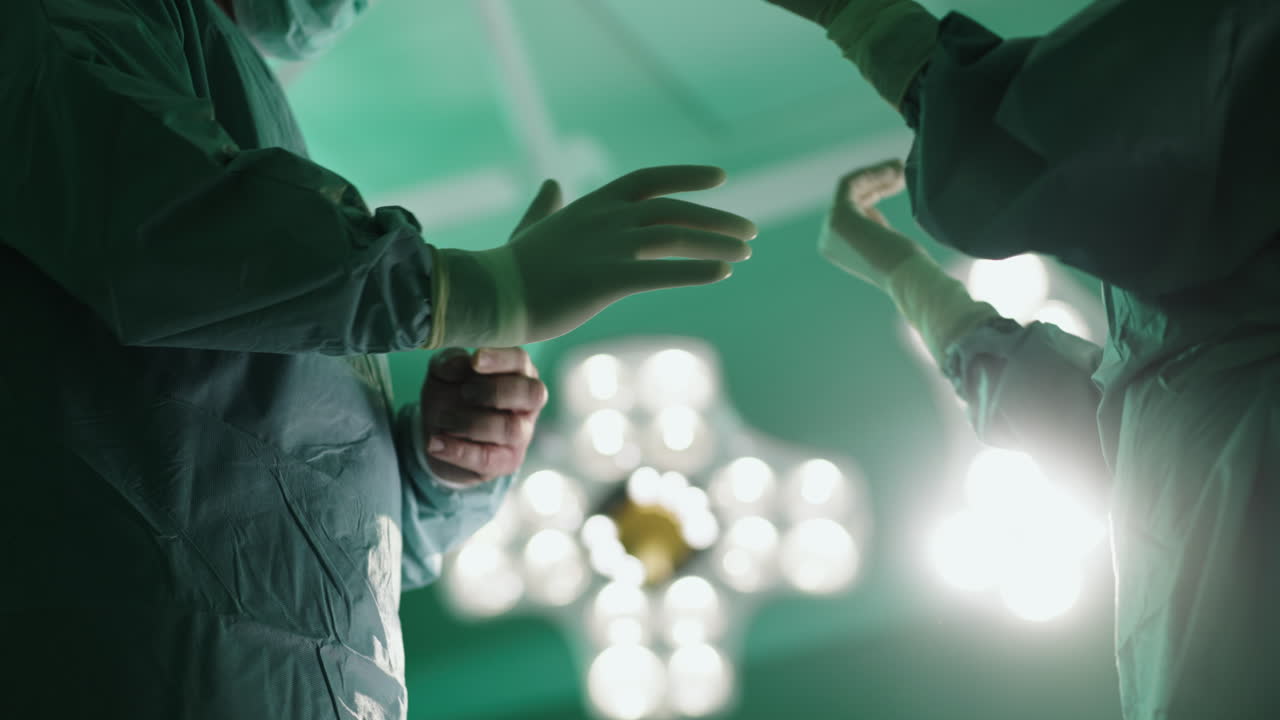 Surgical team preparing for operation in sterile environment