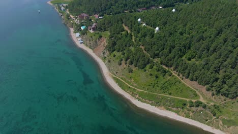 aerial view of a lakeside resort and beach