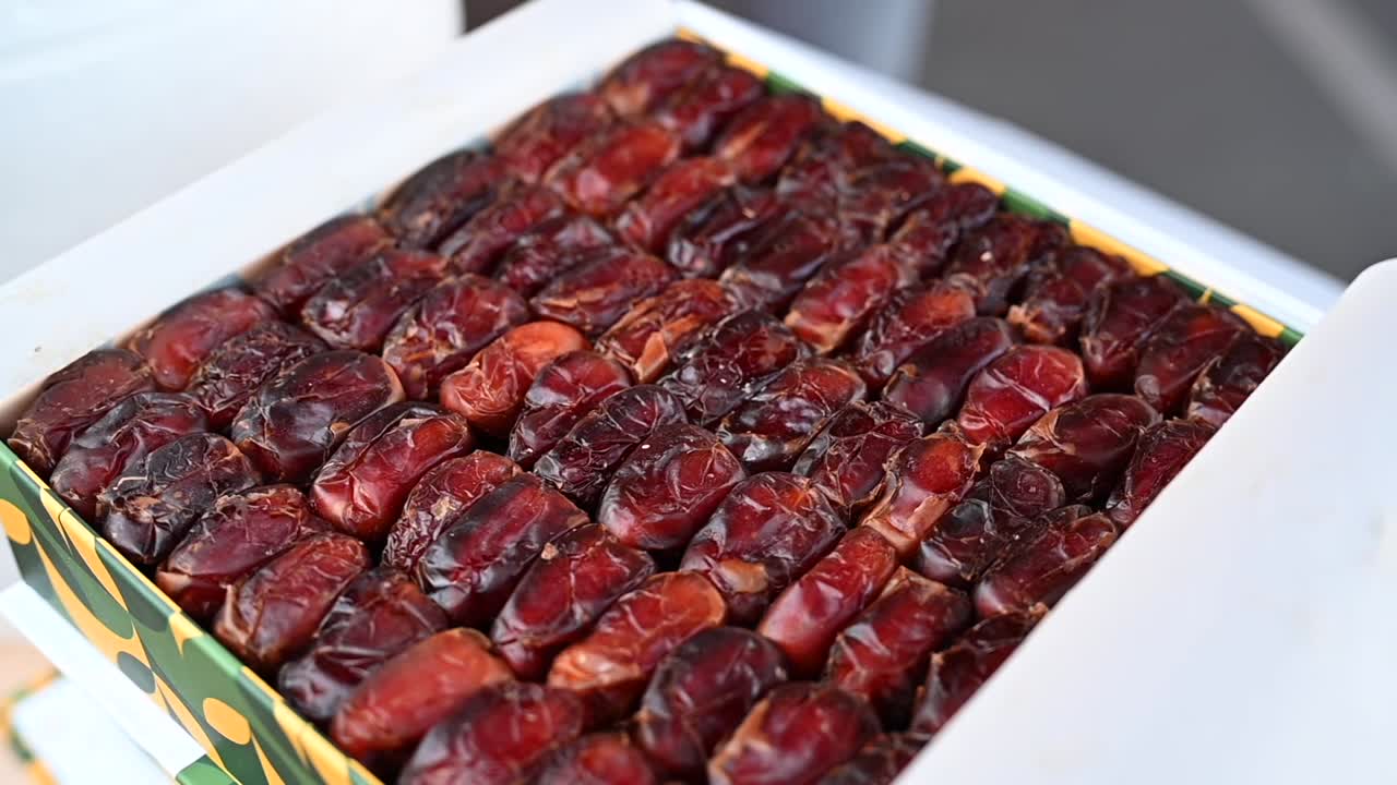 Emirati 'Fard' dates are elegantly packed in a gift box at a local dates shop