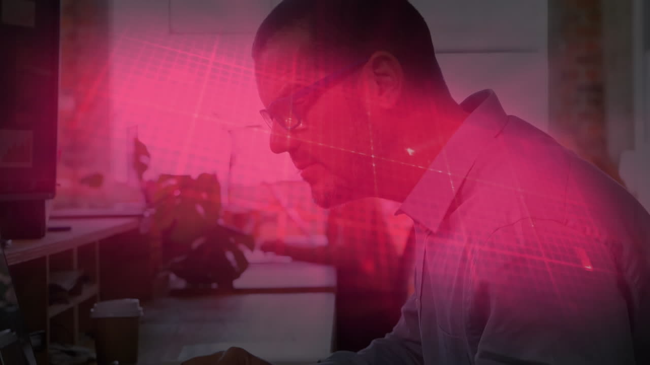 Animation of heart beat monitor over businessman using computer