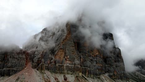 Aerial-views-of-italian-Dolomites-peaks-in-a-foggy-and-cloudy-day