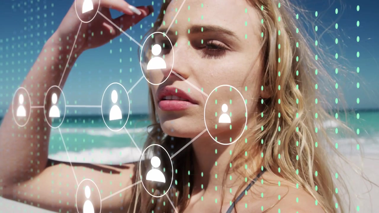 Female model posing, adjusting hair on beach, camera moving closer, starting AR node mesh for ad