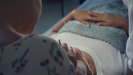 doctor examining patient