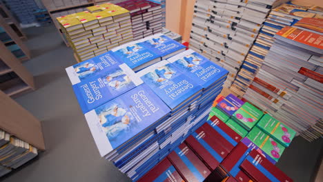 stack of books in the library. close up of library with book shelves for education