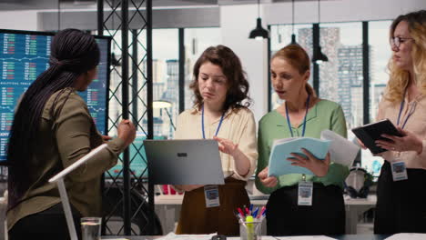 vertical video career focused businesswomen reviewing analytics and aligning objectives