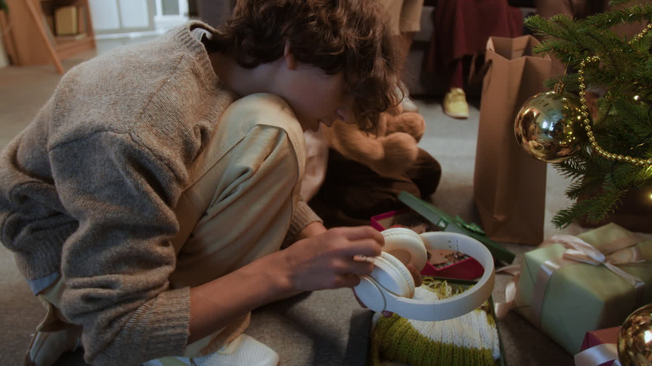 Christmas gift giving scene with family present