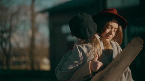 two woman talking train station